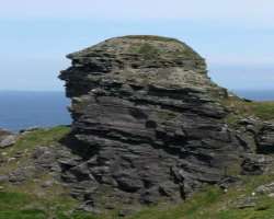The Hag's Head rock formation resembles the face of an old witch looking over the sea and hence the name.